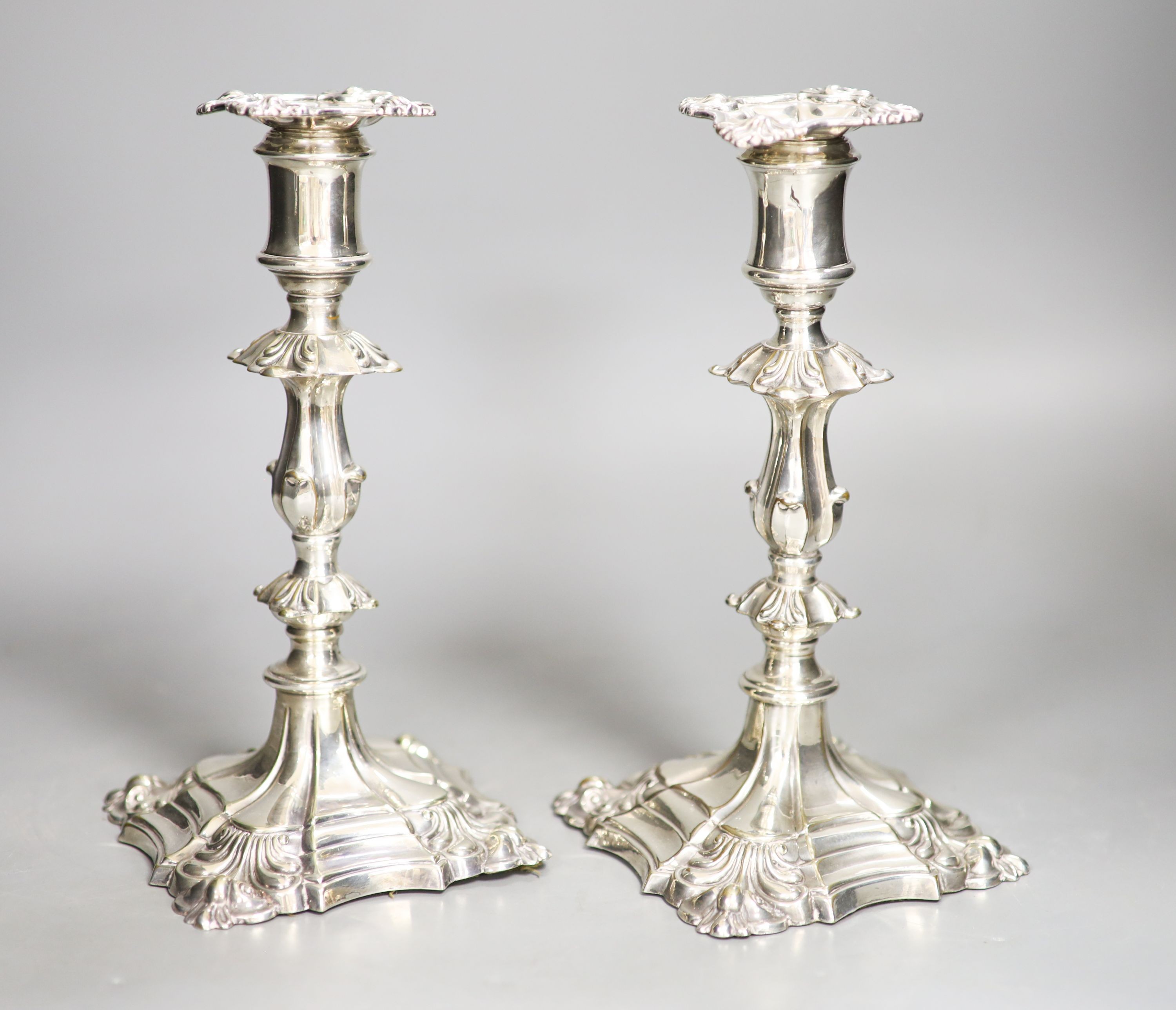 A pair of Victorian silver plated candlesticks 22cm